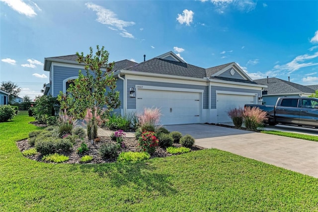 ranch-style home with a garage and a front yard