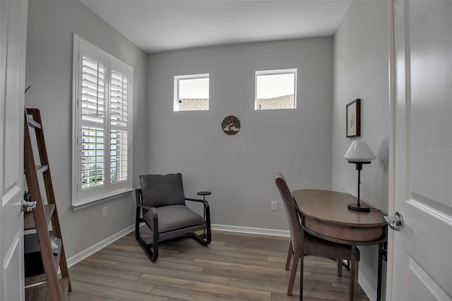 office space with light hardwood / wood-style floors