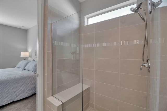 bathroom featuring tiled shower