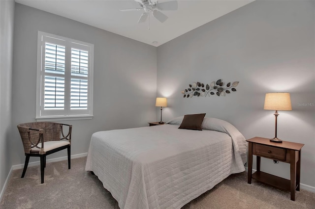 bedroom with ceiling fan and carpet floors