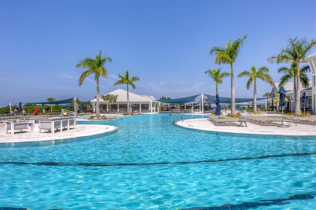 view of swimming pool featuring a patio area