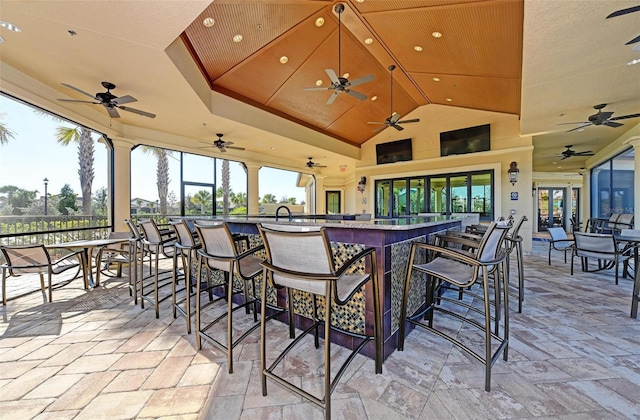 view of patio / terrace featuring an outdoor bar