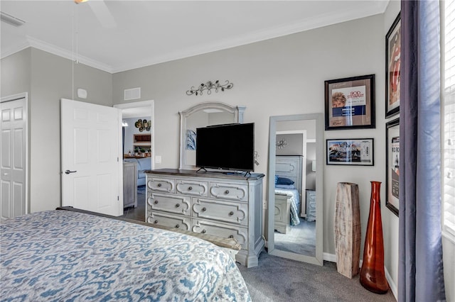 carpeted bedroom with ceiling fan and ornamental molding