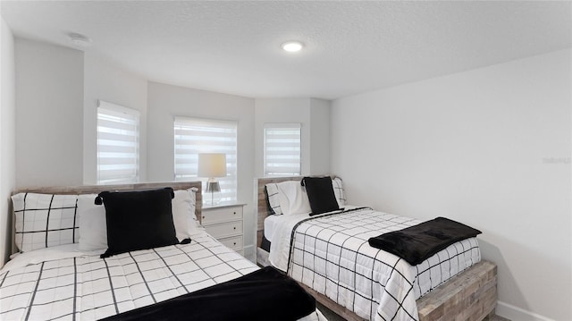 bedroom featuring a textured ceiling