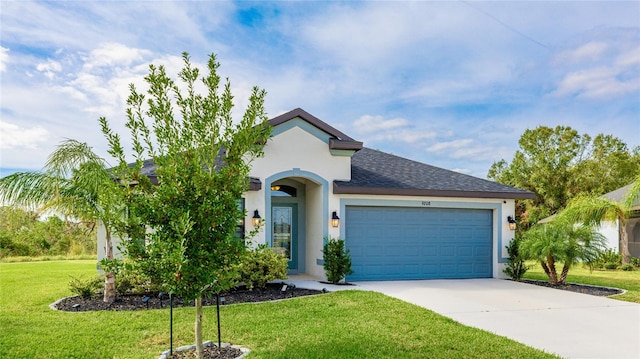 view of front facade featuring a front yard and a garage