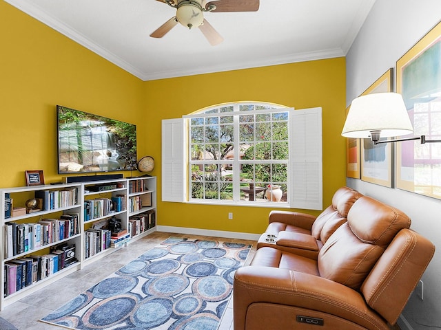 sitting room featuring ceiling fan, ornamental molding, and light tile patterned floors