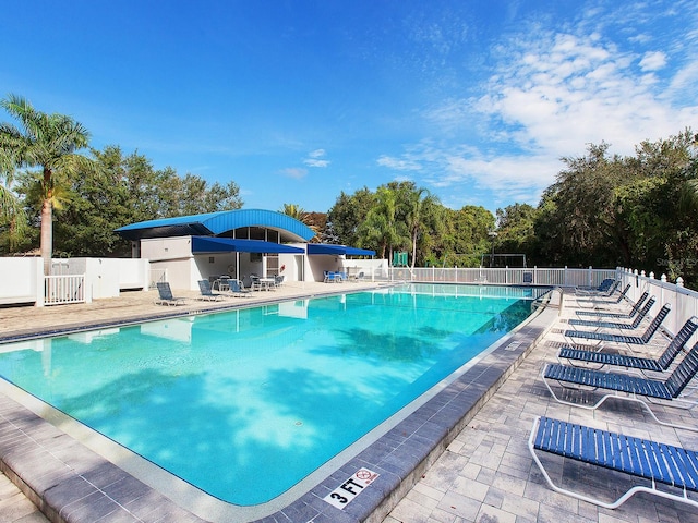 view of swimming pool featuring a patio