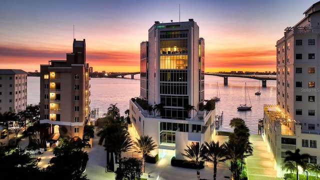 property's view of city featuring a water view