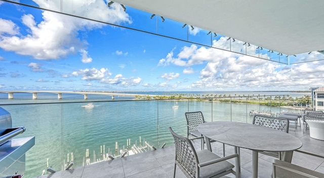 view of patio featuring a water view