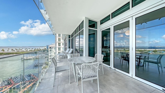 balcony featuring a water view