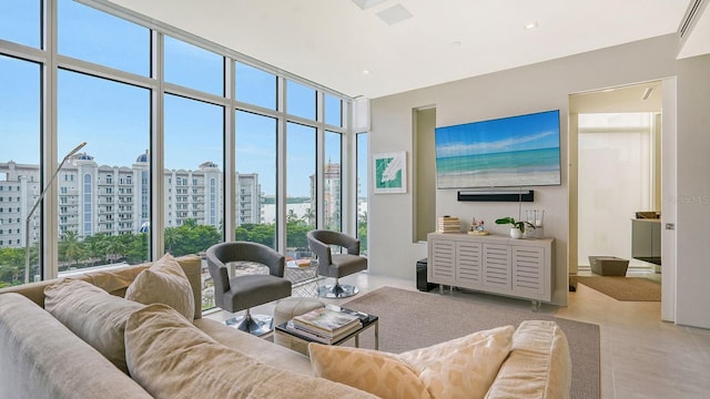 living room with floor to ceiling windows