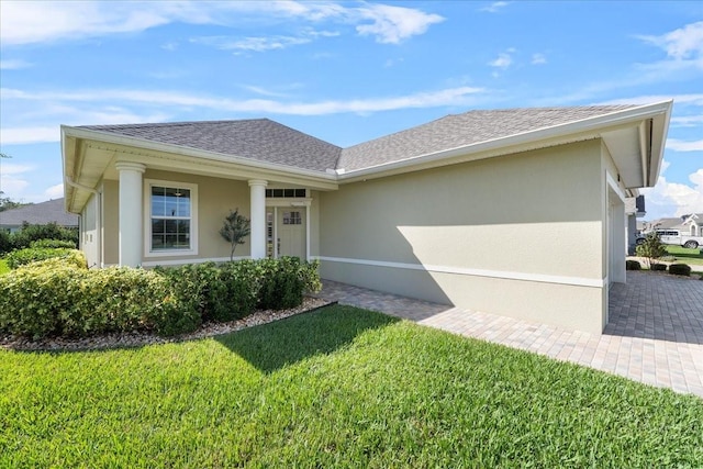 exterior space with a front lawn