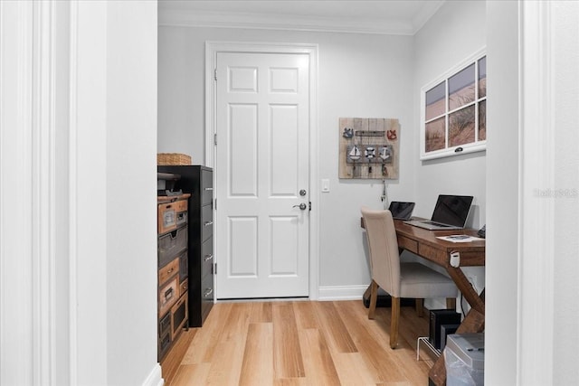 office featuring wood-type flooring and ornamental molding