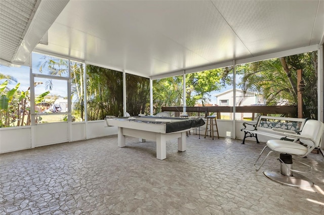 sunroom / solarium featuring billiards