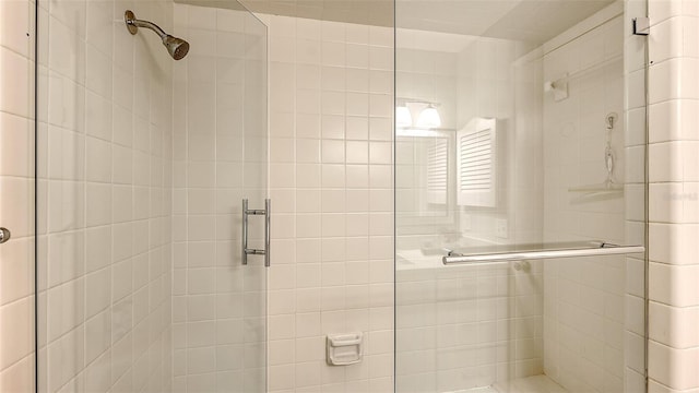 bathroom with an enclosed shower