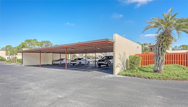 view of parking with a carport