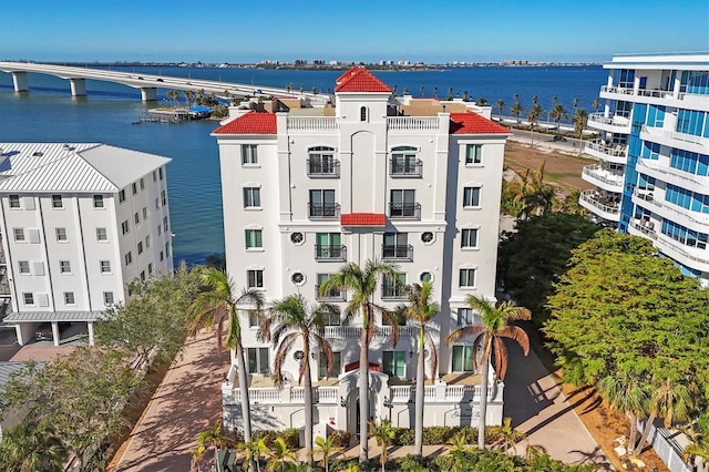 view of building exterior featuring a water view