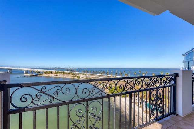 balcony featuring a water view