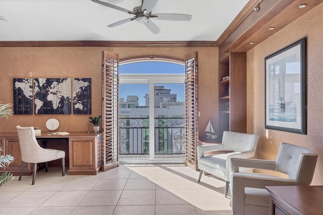 interior space featuring a healthy amount of sunlight, light tile patterned floors, ceiling fan, and crown molding