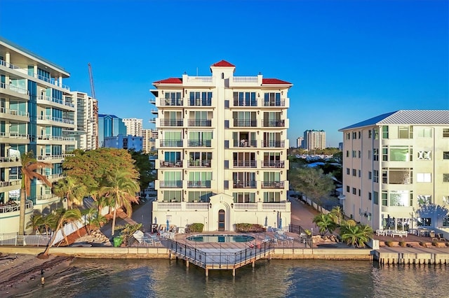 view of building exterior featuring a water view