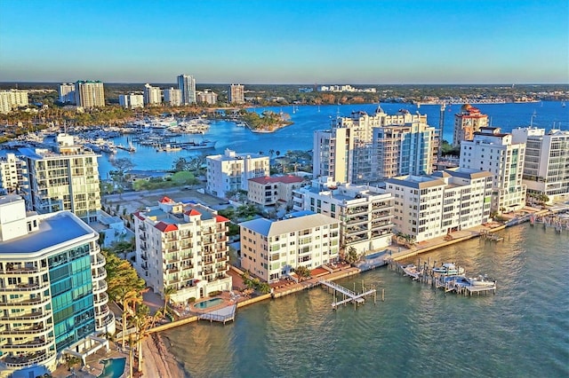 drone / aerial view with a water view