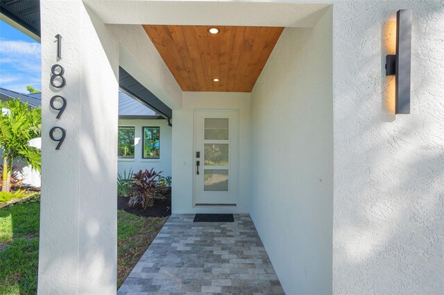 1899 Buccaneer Cir, Sarasota, FL 34231 - view of exterior entry with stucco siding