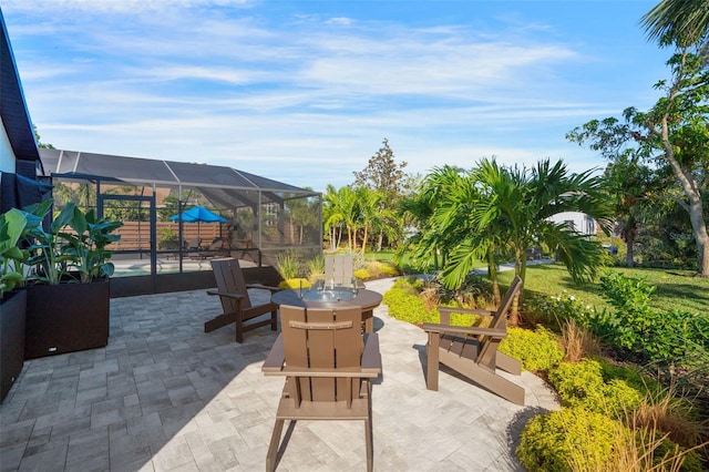 view of patio / terrace with glass enclosure