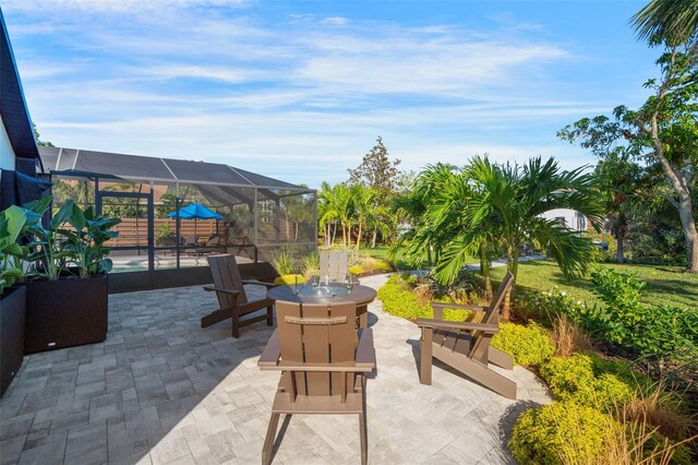 1899 Buccaneer Cir, Sarasota, FL 34231 - view of patio / terrace featuring a lanai and an outdoor pool