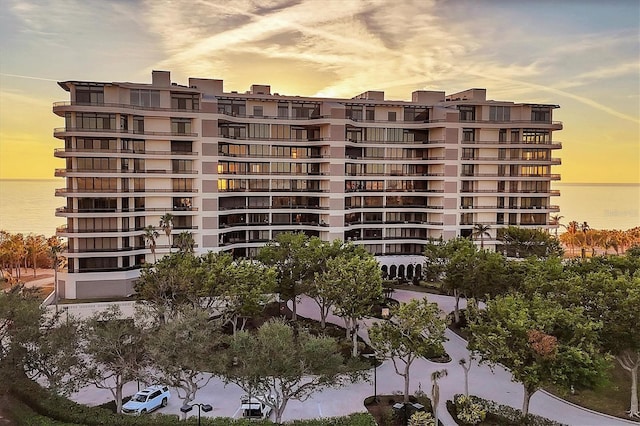 outdoor building at dusk with a water view