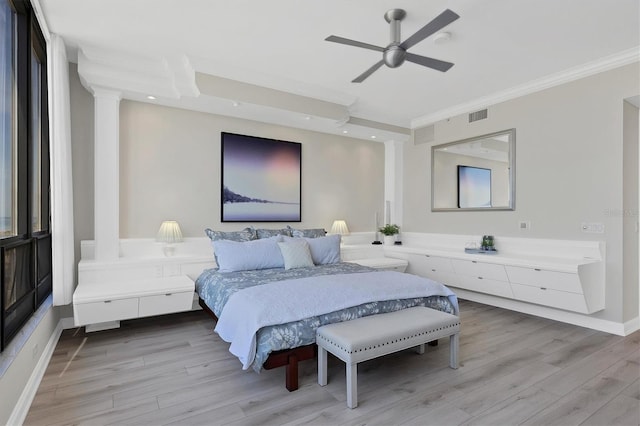 bedroom featuring ceiling fan, light hardwood / wood-style flooring, and ornamental molding