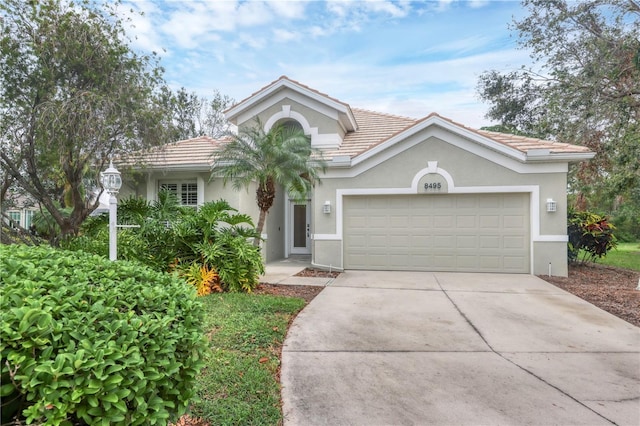 view of front of home with a garage