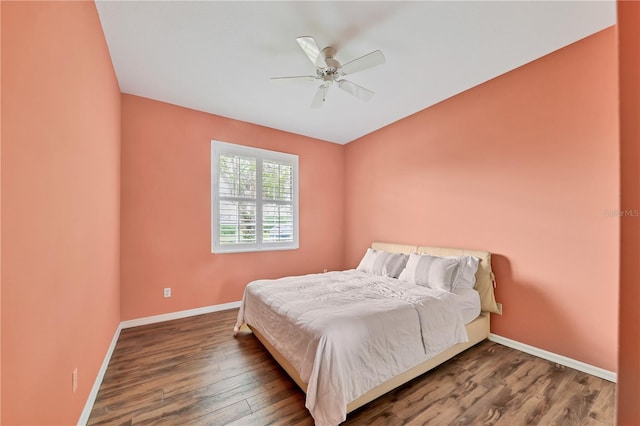 bedroom featuring ceiling fan and wood-type flooring