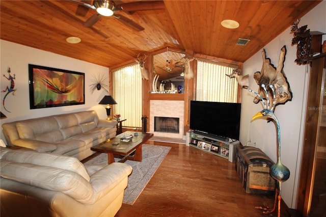 living room with a wealth of natural light, ceiling fan, wooden ceiling, hardwood / wood-style floors, and lofted ceiling