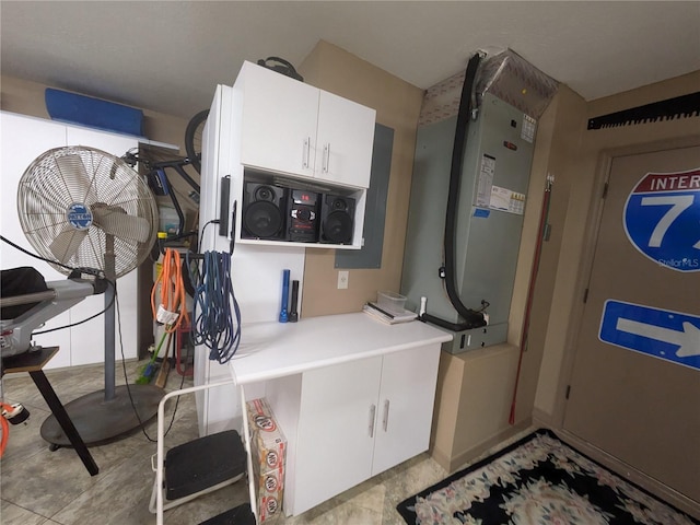 laundry area featuring cabinets