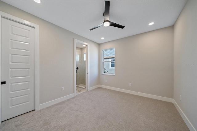 carpeted empty room with ceiling fan