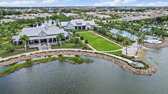 birds eye view of property featuring a water view