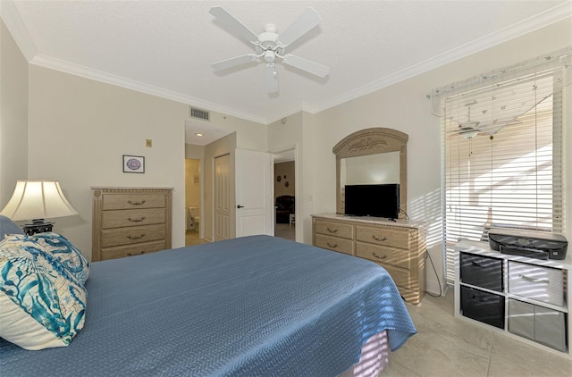 bedroom with ceiling fan, a closet, and ornamental molding