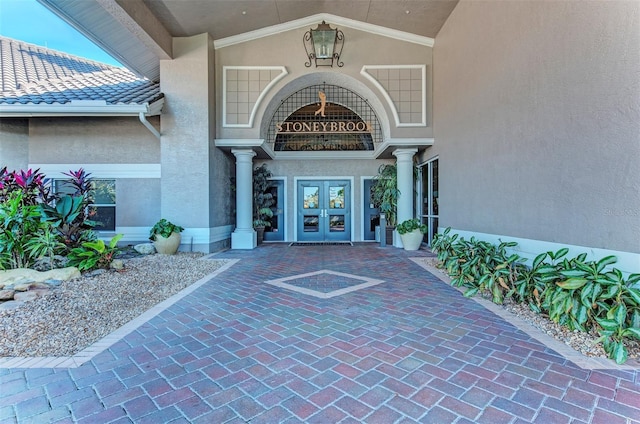 4655 Tower Hill Ln Unit 2412, Sarasota, FL 34238 - entrance to property with french doors and stucco siding