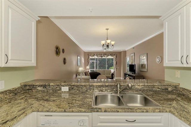 kitchen featuring a notable chandelier, crown molding, white cabinetry, and sink