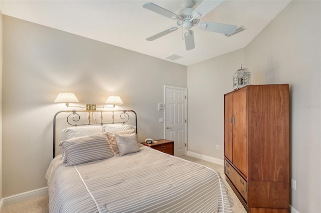 carpeted bedroom featuring ceiling fan and lofted ceiling