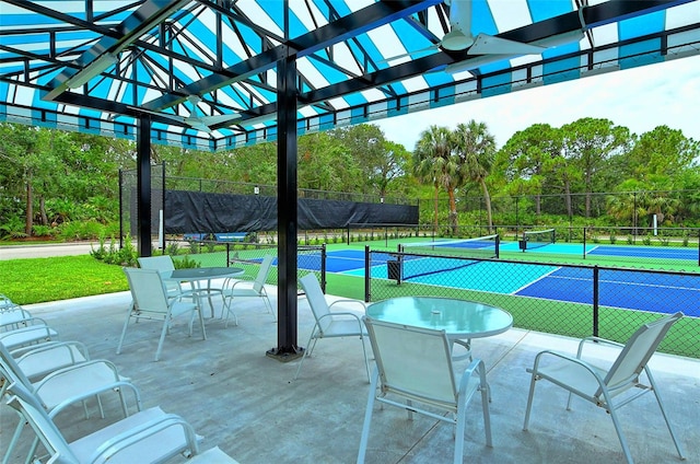 view of patio with tennis court