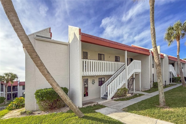 1801 Gulf Dr N Unit 222, Bradenton Beach, FL 34217 - view of building exterior with stairway