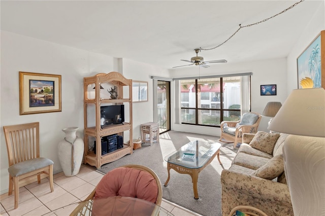 1801 Gulf Dr N Unit 222, Bradenton Beach, FL 34217 - living area featuring a ceiling fan and light tile patterned flooring
