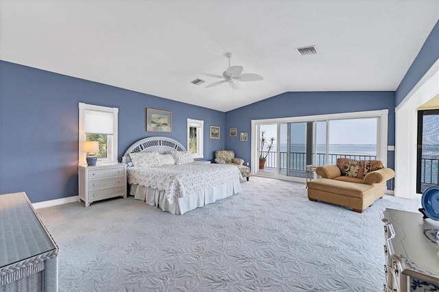 bedroom with access to exterior, light colored carpet, ceiling fan, a water view, and lofted ceiling