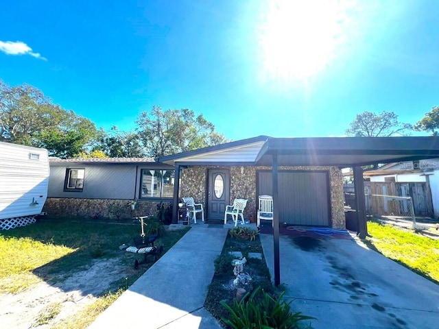 view of front of home with a carport