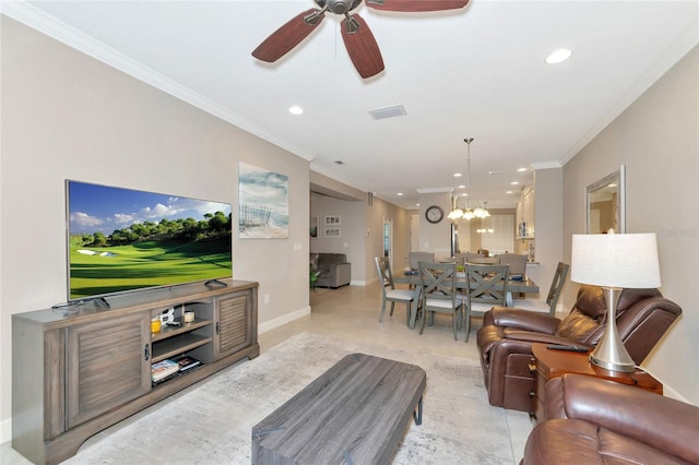 living room featuring crown molding and ceiling fan