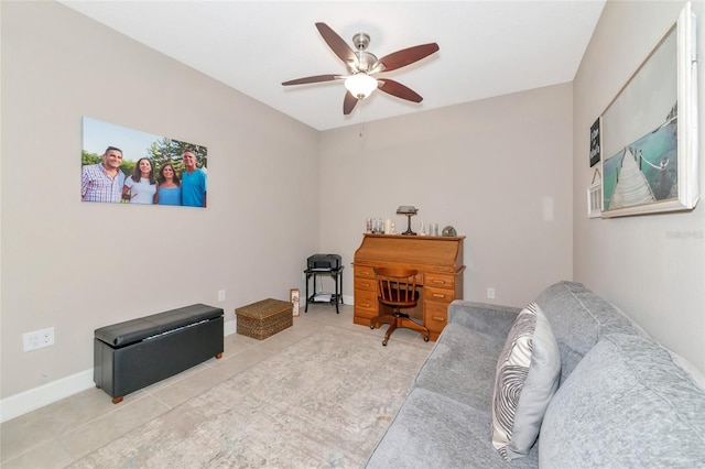 tiled living room featuring ceiling fan