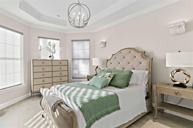 bedroom featuring a chandelier, a raised ceiling, crown molding, and multiple windows