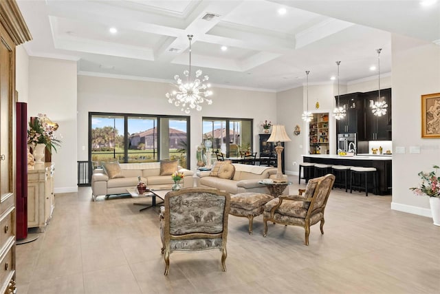 tiled living room with beam ceiling, crown molding, coffered ceiling, and a notable chandelier