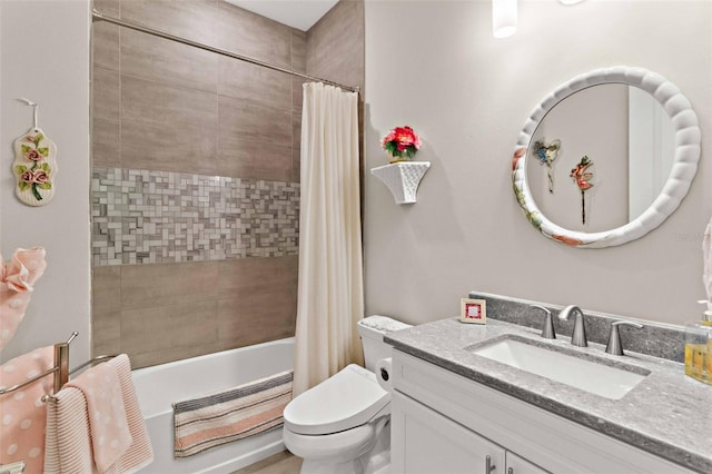 full bathroom featuring vanity, toilet, and shower / bathtub combination with curtain